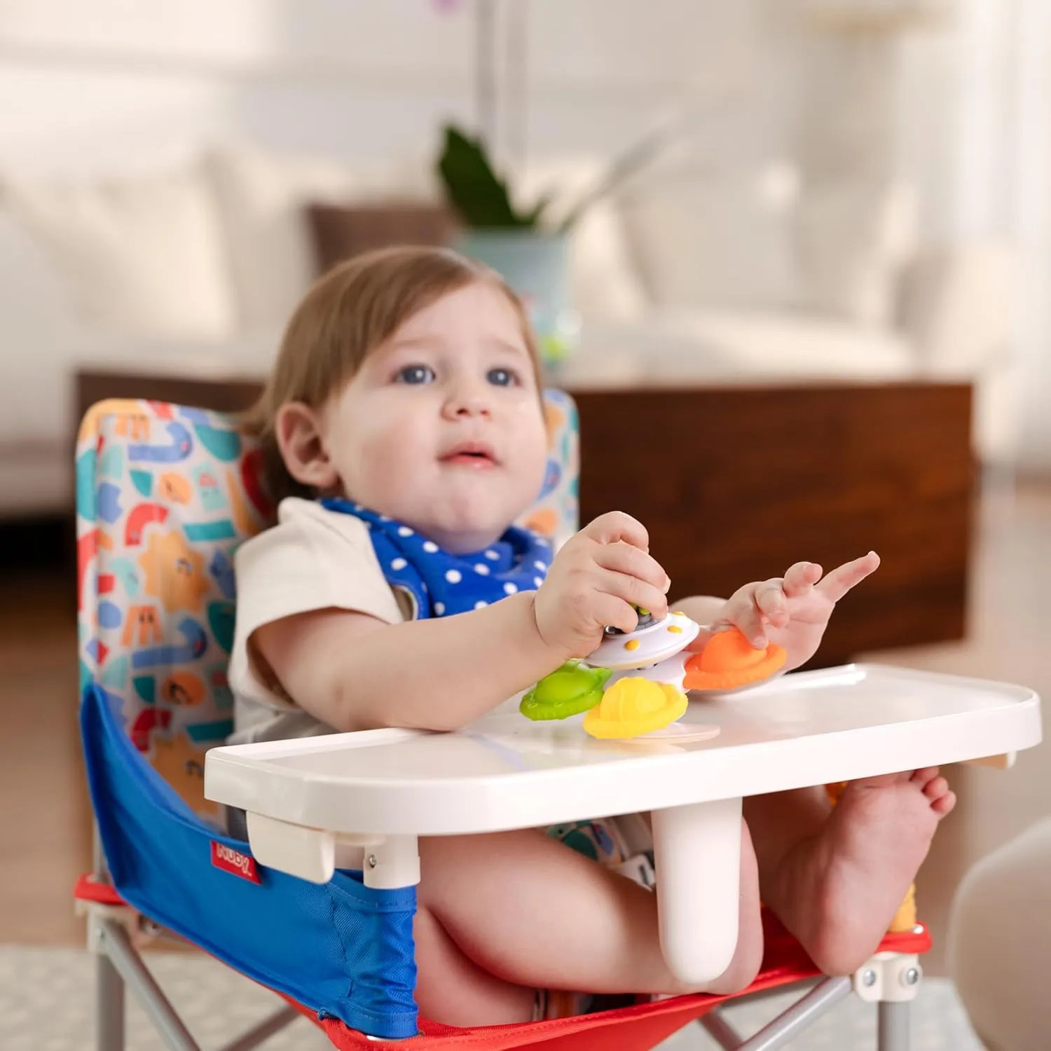 Nuby Easy Go Pop-Up Booster Seat with Removable Tray - 6  Months - Portable Booster Seat for Floor for Indoor/Outdoor Use - 3-Point Safety Adjustable Straps - Includes Travel Bag - Fun Faces
